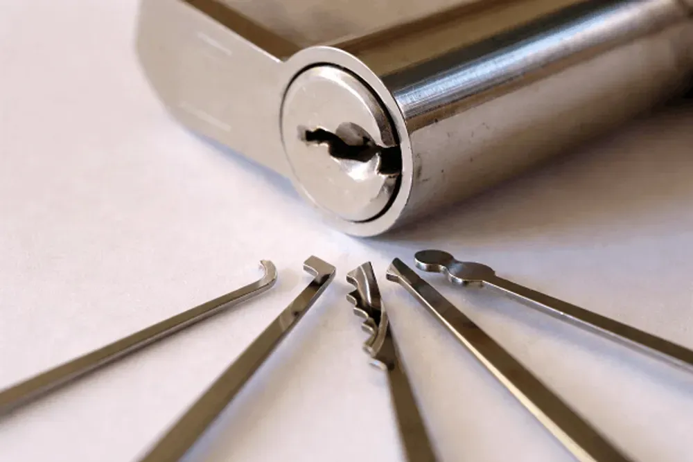 Professional locksmith performing non-destructive entry